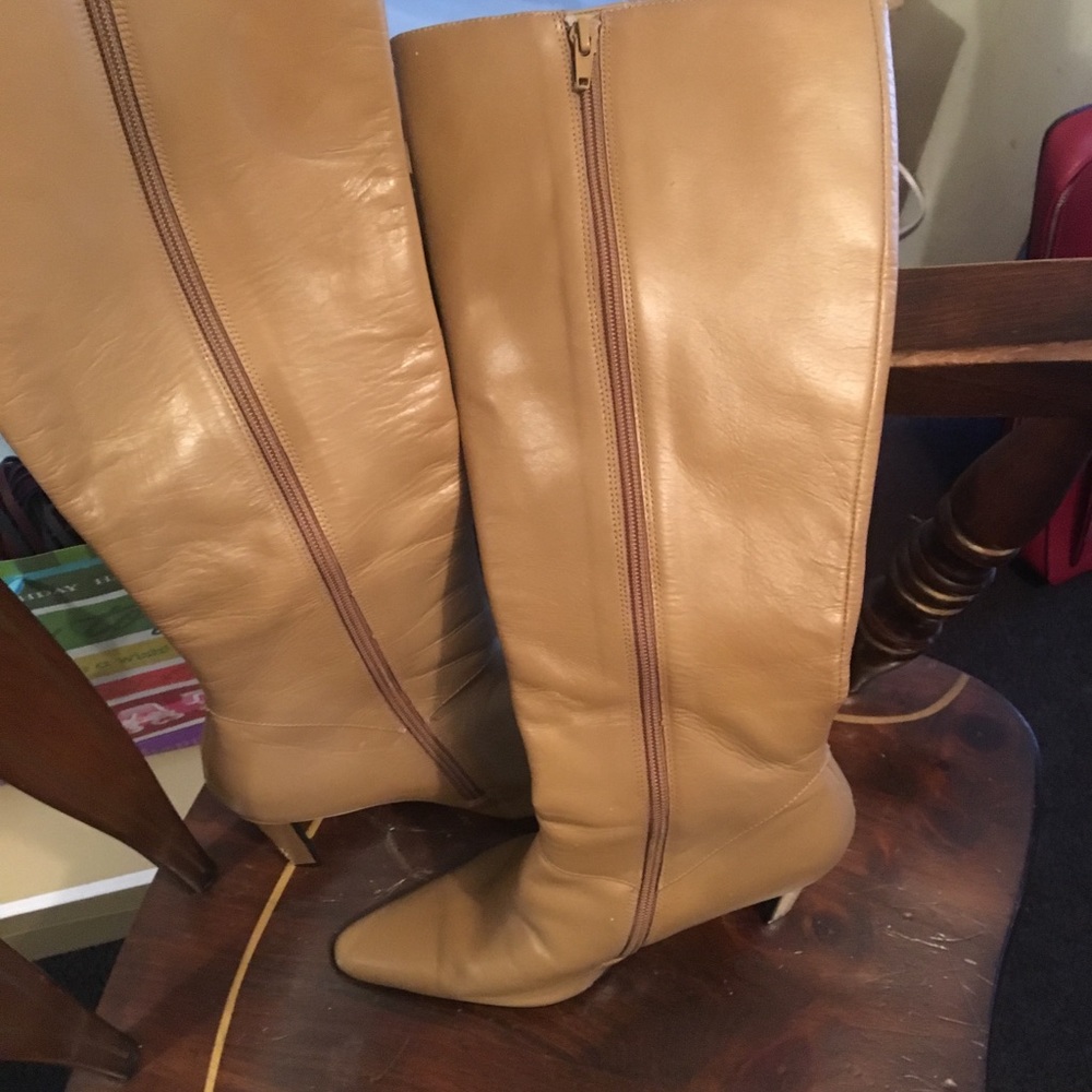 Tan leather boots worn once.
